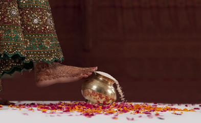 Close-up of bride's leg during wedding ceremony 