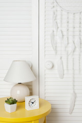 White dream catcher on door background