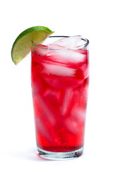 red cocktail with a lime