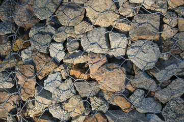 stones under the net
