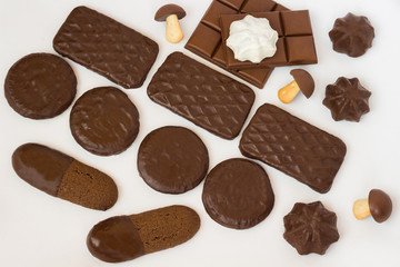 Chocolate cookies different of shape on  white background