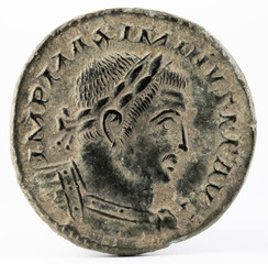 Ancient Roman copper coin of Galerius Maximianus. Obverse.