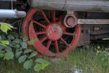 Fototapeta na wymiar Detail ofa an old locomotiv wheel