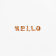 Word Hello made of sweet cookies letters. Flat lay, top view.