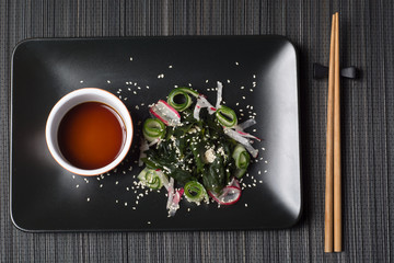 Wakame salad with sesame seeds © Wojciech Bobrowicz