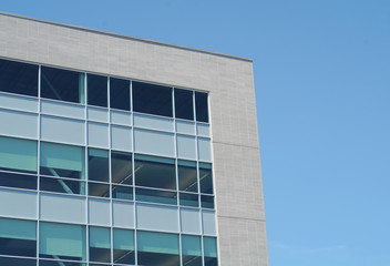 business building corporate office corner white brick and windows