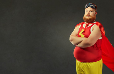 Funny man in a superhero costume