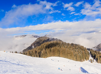 Fototapeta na wymiar On the slopes of the ski resort Soll, Tyrol, Austria