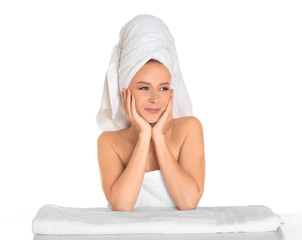 Beautiful young woman after bath on white background