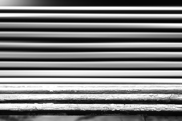 Horizontal black and white bench bokeh background