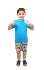 Cute boy with toothbrush and paste on white background. Teeth cleaning concept