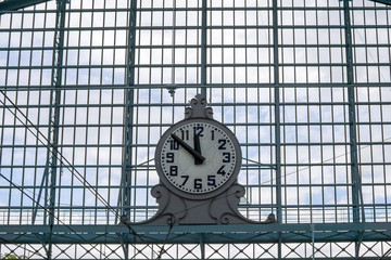 Giant clock in a train station, platform. time concept