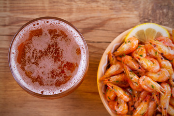 Glass of beer and shrimps. Beer and prawns