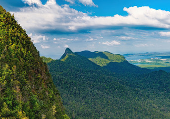 Panoramic view of blue sky, sea and mountain seen from Cable Car viewpoint, Langkawi, Malaysia. Picturesque landscape with beaches, small Islands and tourist ships at waters of Strait of Malacca