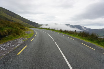 Fototapeta premium A road going through clouds, Wild Atlantic Way, Ireland
