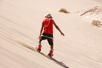 Sandboarding in the Dessert of the Atacama, San Pedro de Atacama, Chile, South America