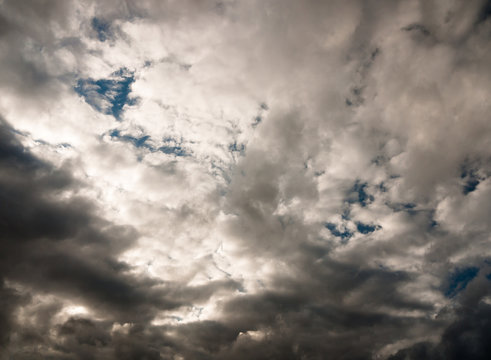 moody cloudy sky above texture and pattern background