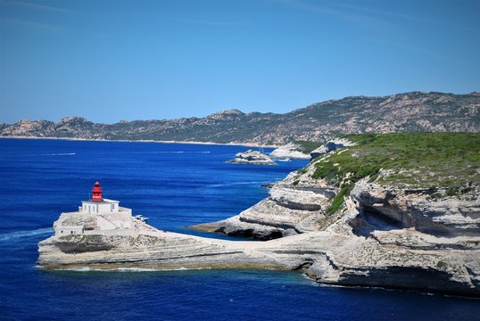 mountains embrassing the sea