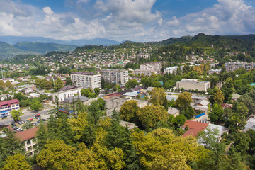 Fototapeta na wymiar Day aerial cityscape of Sukhum downtown, Abkhazia in summer from the roof