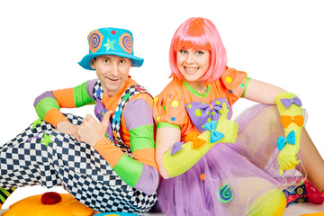 Couple comic artists on the background of a white wall. creative, fun, theater, show, actor concept