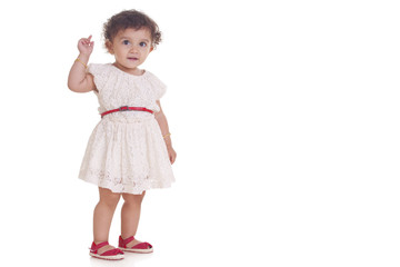 Full length of innocent girl against white background