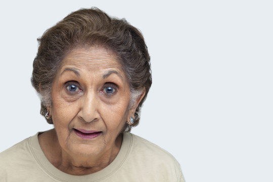 Portrait of an old woman with raised eyebrows 