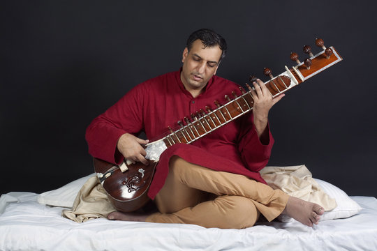 Man playing the sitar 