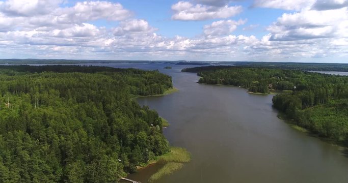 Lohjanjarvi, Cinema 4k aerial view above lohjanjarvi lake and lohjansaari island, on a sunny day,in Lohja, Uusimaa, in Finland the land of thousand lakes