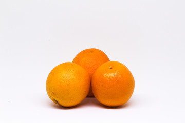three oranges isolated on white background, strong color and good quality, for trimming.