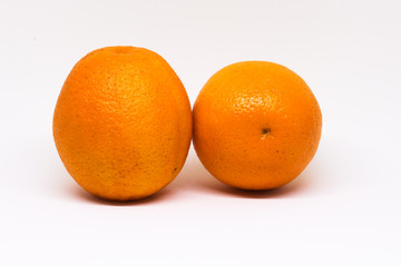 two oranges isolated on white background, strong color and good quality, for trimming.