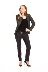 Dark blonde woman wearing smart casual outfit with hand on the chin on white background