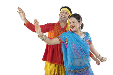Gujarati couple dancing 