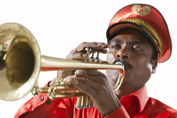 Close-up of bandmaster playing on a trumpet © IndiaPix