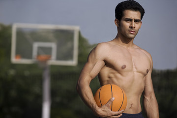 Man holding a basketball 