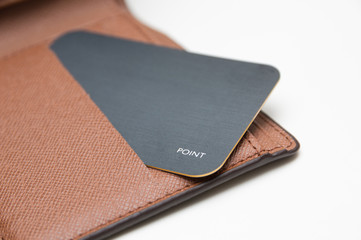 card in wallet on white background