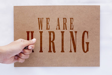 We Are Hiring Text On Wooden Board