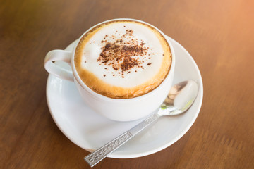 white cup of coffee