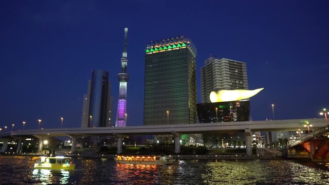 4k cinematic b-roll footage of sunset blue hour scene at Tokyo city skyline and Sumida River Bridge.