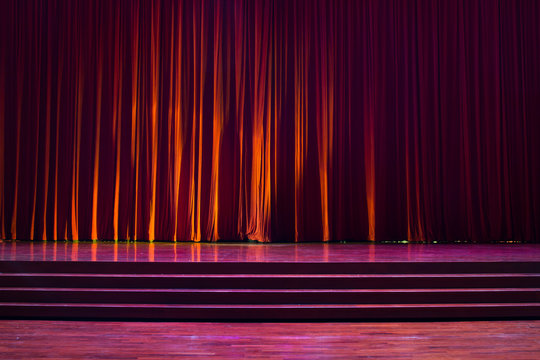 Stage wood and red curtains.