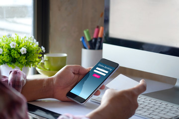 Shopping online Concept. man using smartphone and credit card for payment or shopping online.