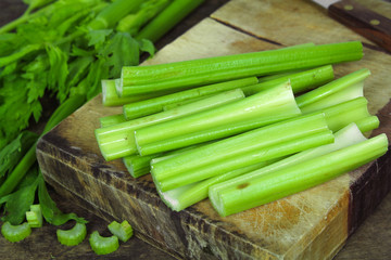 Fresh green celery isolated on white background