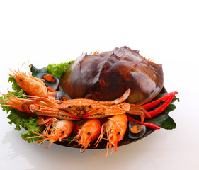 Mixed seafood grill isolated on white clipping path.