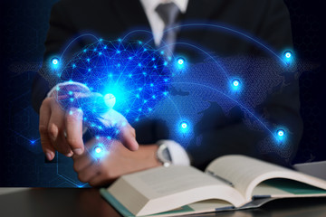 Businessman hand touching future sign and light blue polygon brain and line node networking world map as business, globalization, technology, communication, innovation and knowledge concept