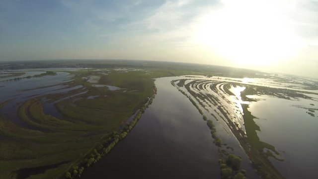 Spring river flood and horizon aerial view