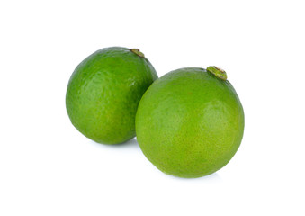 whole fresh lime on white background
