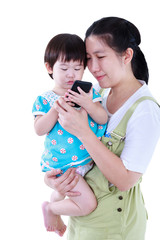 Mother with her daughter. Girl using electronic gadget. Isolated on white background.