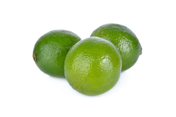 whole fresh lime on white background