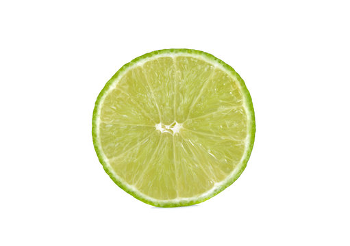 half cut fresh lime on white background