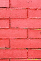 Red brick wall fragment, abstract texture, selective focus, vertical