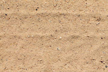 Dry yellow sand with particles, abstract texture